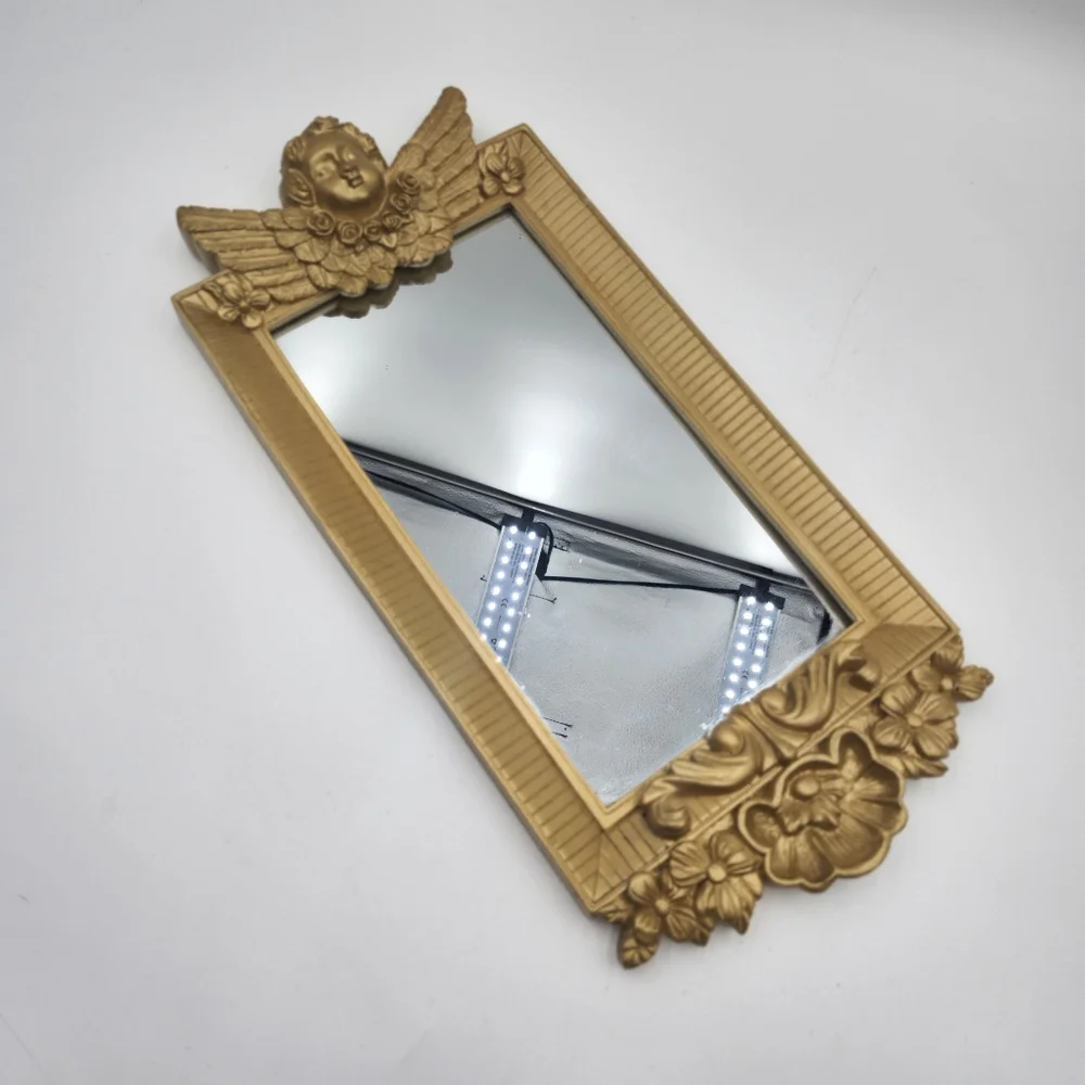 Vintage gold 80s Hollywood Regency Cherub Angel Figural Wall Mirror guilded